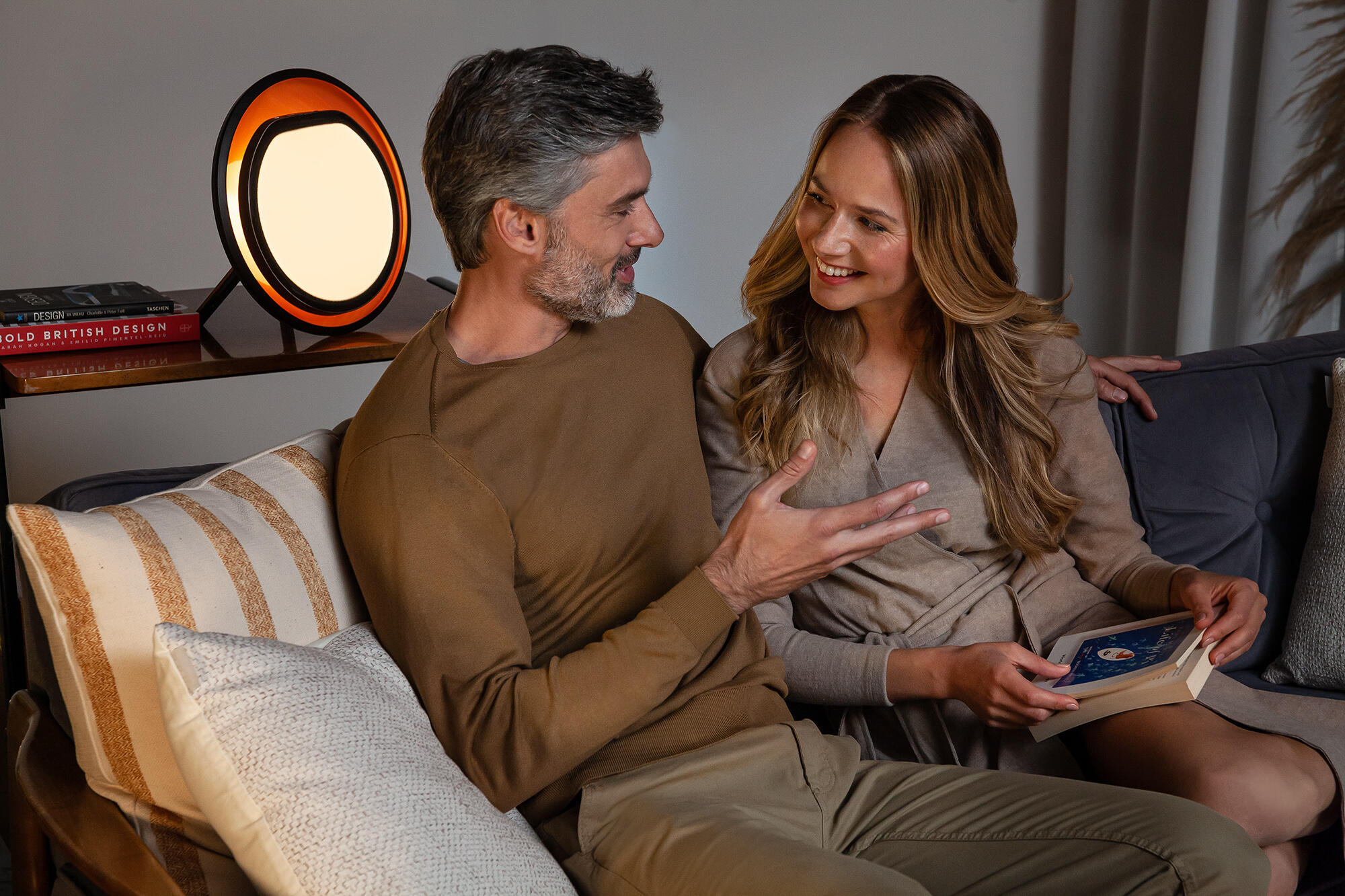 Two people relaxing with Halo in Evening Mode